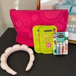 Thirty one bag with 2 peel- off masks, headband and 3 chapstick
